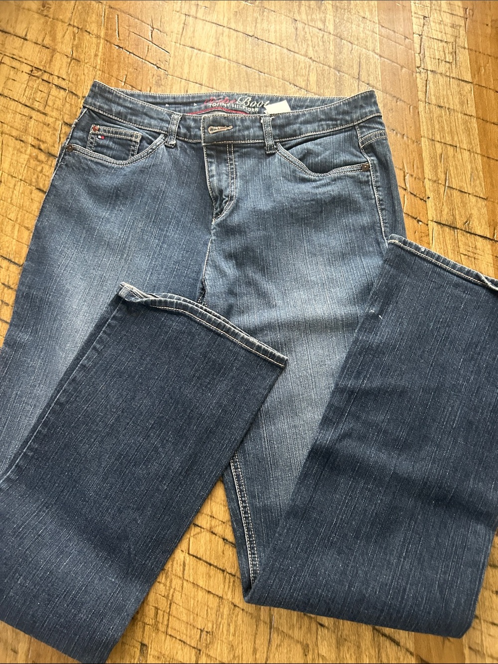 Tommy Hilfiger ladies bootcut 10L jeans. 33” inseam.